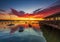 Spectacular sunset over boats at Sandbanks, Poole Harbour, Dorset