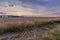 Spectacular sunset over stubble field