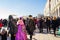 Spectacular Venice Masquerade celebration costumes and crowd of tourists Italy