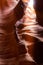 Spectacular vertical shot of a slot canyon with a light ray in Lower Antelope Canyon