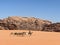 The spectacular view of camels and beduin inside of Wadi Rum dessert