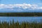 Spectacular view from the Edgerton Highway over Willow Lake to Mount Sanford and other volcanoes of the Wrangell Mountains.