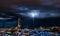 Spectacular view of Historic Triana Neighborhood and Seville city skyline a stormy night. Seville city, Tradition and Modernity