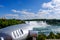 Spectacular view of Niagara falls showing nearby viewing binoculars.