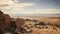 Spectacular view over a vast desert from a rocky outcrop