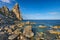 Spectacular view of Punta Pedra Longa and azure water in sea
