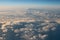 Spectacular view of a sunset above the clouds from airplane wind