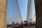 Spectacular views of the Brooklyn Bridge with all its characteristic metal wires and the pedestrian walkway