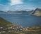 Spectacular views of the scenic fjords on the Faroe Islands near the village Funningur with snow-covered mountains