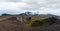 Spectacular volcanic view from Saxholl Crater, Snaefellsnes peninsula, West Iceland. Snaefellsjokull snowy volcano top in far