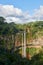 A Spectacular Waterfall near the inland town of Chameral on the Island of Mauritius, with 2 Streams of water tumbling down.