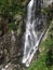 Spectacular waterfall with Rainbow in Fagaras Mountains