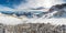 Spectacular winter mountain panorama with peaks covered with early snow.