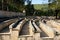 Spectator seats of Old Amphitheater in small resort mountain city Dilijan, Armenia