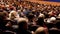 Spectators in the auditorium and watch the show. Time-lapse recording. Theater of the young spectator. Saratov, Russia