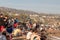 Spectators at the beach watching the surf