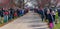 Spectators line the last leg of the Chicago Polish Independence day 5k run