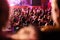 Spectators sit in the hall and watch a concert. People in the auditorium watching the performance. Theater audience