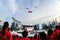 Spectators standing at attention as the national flag flypast during National Day Parade (NDP) Rehearsal 2013