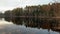 Specular reflection in water, the coast at sunset, the picturesque sunset, quiet water, Mirror in water, clouds are