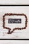 Speech bubble made from coffee beans with I love coffee message.