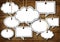 Speech Bubbles Hanging on Wooden Background