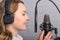 Speech recording on radio stations, the announcer works in the studio with a studio microphone