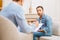 Speechless male patient listening psychologists advice