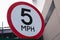Speed 5 mph sign. Five miles per hour traffic sign.