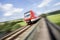 Speed blurred passenger train outdoors