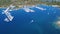 Speed boat arriving in dock harbor. Aerial view