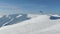 Speed gliding man on top of the snowy mountain, beautiful aerial shot