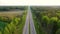 Speed Intercity Highway Through Forest With Moving Cars And Trucks Aerial View