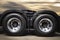 Speed motion wheels spin of semi truck. Metal chrome wheel. truck tires.