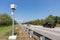 Speed trap surveillance camera along highway to control speeding