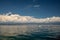 Speedboat cruising the calm sea of Lovran in Croatia on a blue sky background