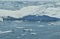 Speedboat and Icebergs in Disko Bay Greenland.