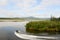 A speedboat leaves a wake in the Chena River near Fairbanks, Alaska.