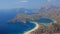 Speedboat sails to Oludeniz Beach, leaving curly trail in the water