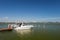 Speedboats moored to a jetty