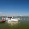 Speedboats moored to a jetty