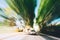 Speeding Car On A Highway, Country Asphalt Road. Motion Blur Background. Dangerous Drive