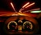 Speeding car at night