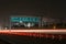 Speeding cars on modern Road infrastructure in Gurgaon, Delhi, India.Artistic long exposure shot at night