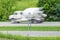 Speeding Concrete Truck Races Past Speed Limit Sign