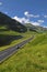 Speeding motorbike on mountain road in Scotland