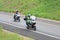 Speeding motorbikes travelling onto freeway onramp