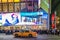 A Speeding Taxi in Times Square, New York City. Street and Stores with Bright Lights and Animated Screens