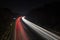 Speeding traffic on M40 motorway leaves light trails from fast moving cars.