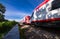 A speeding train on railroad tracks, image blurred by speed. Vivid picture.